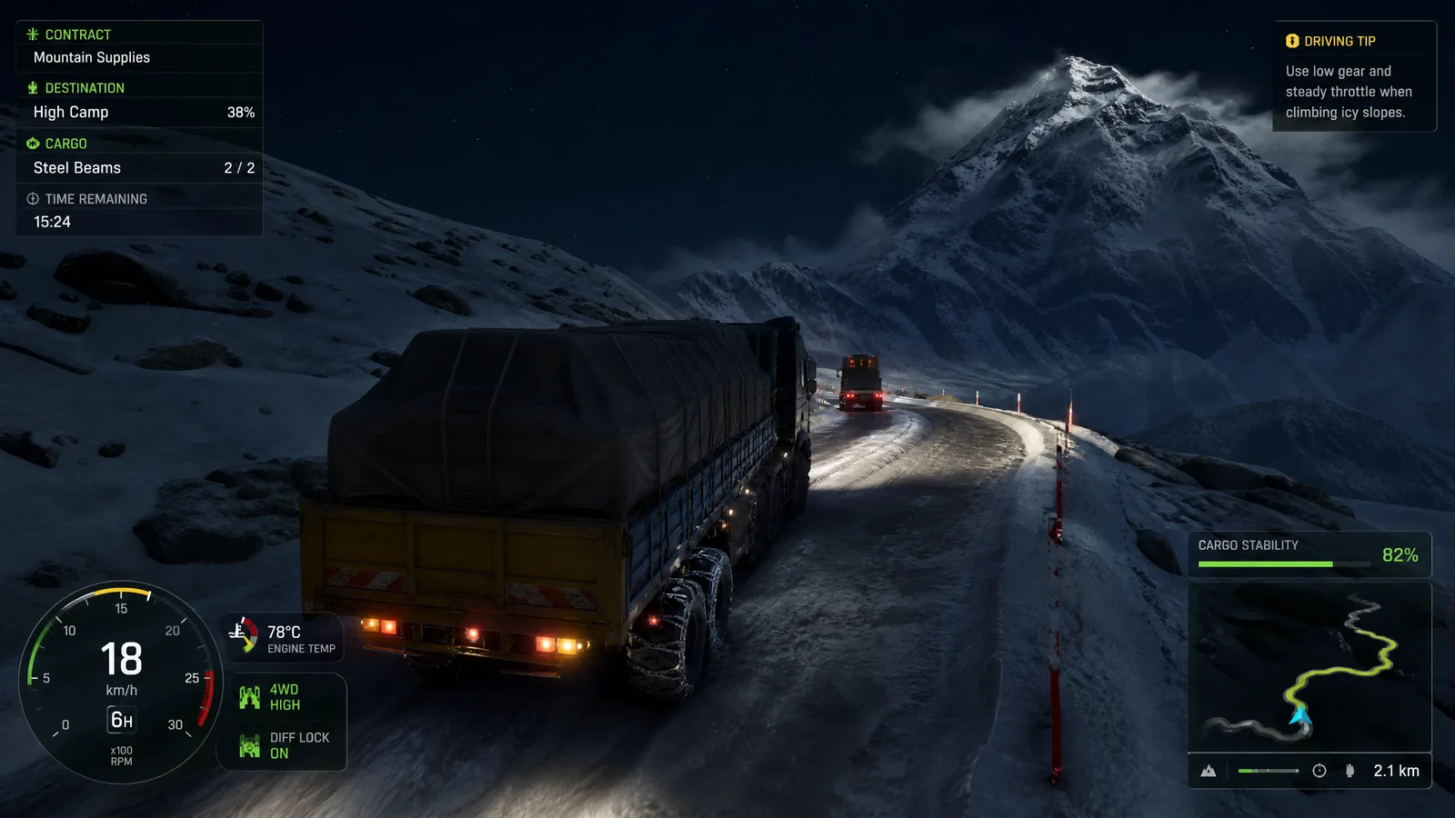 Alpine truck simulation gameplay with a chained freight truck climbing a snowy switchback, route minimap and cargo stability HUD.