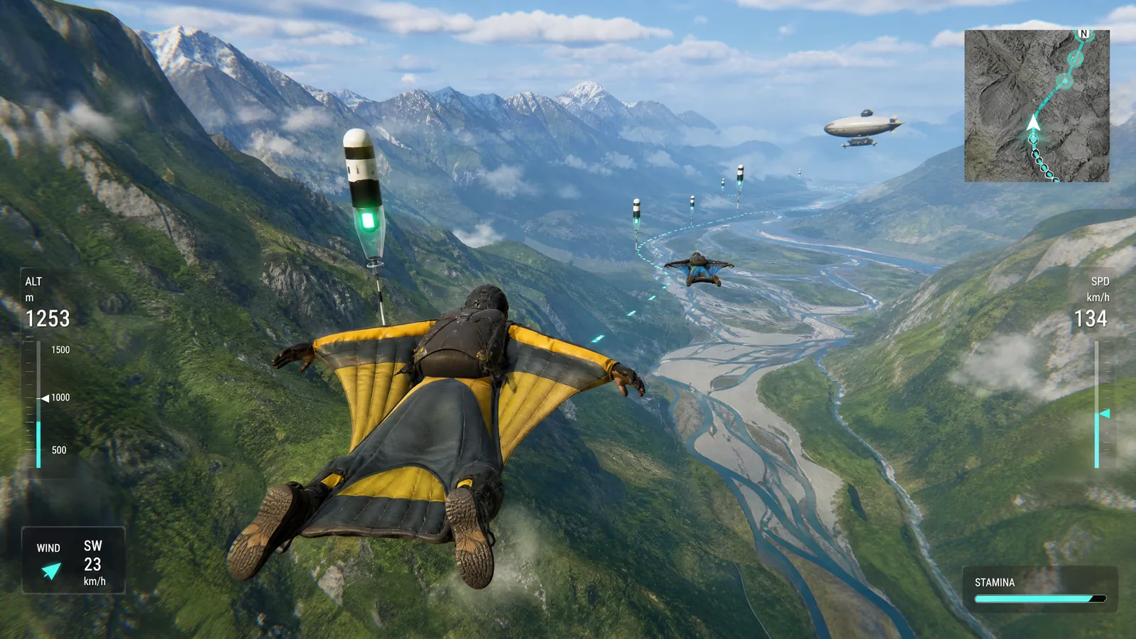 Aerial exploration gameplay behind a wing-suit glider over green ranges and survey beacons, with altitude, wind and stamina HUD.